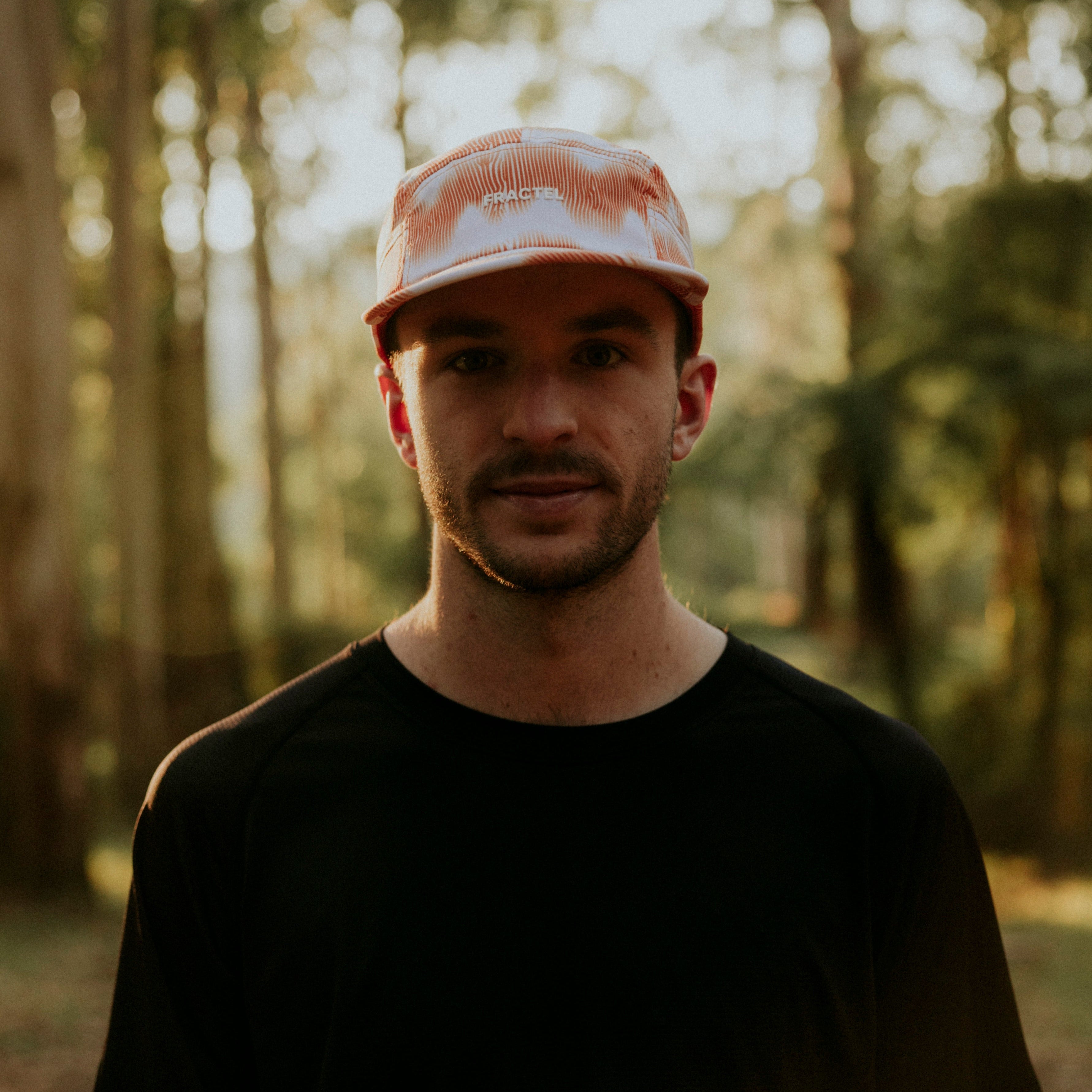 VELOCITY Orange M-Series Cap on Model