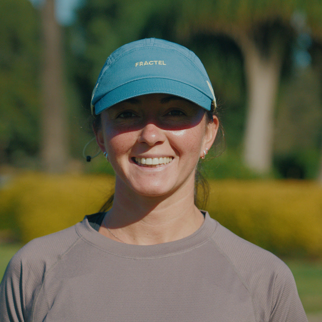 Person wearing the Fractel E-GAMBIER Running Cap, front view