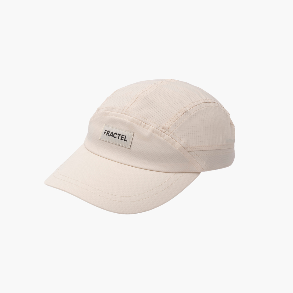 Fractel E-Sierra Chalk running cap in white, angled view