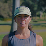 Person wearing the Fractel E-UNFURL Running Cap, front view