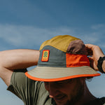 Orange Running Bucket Hat on Model