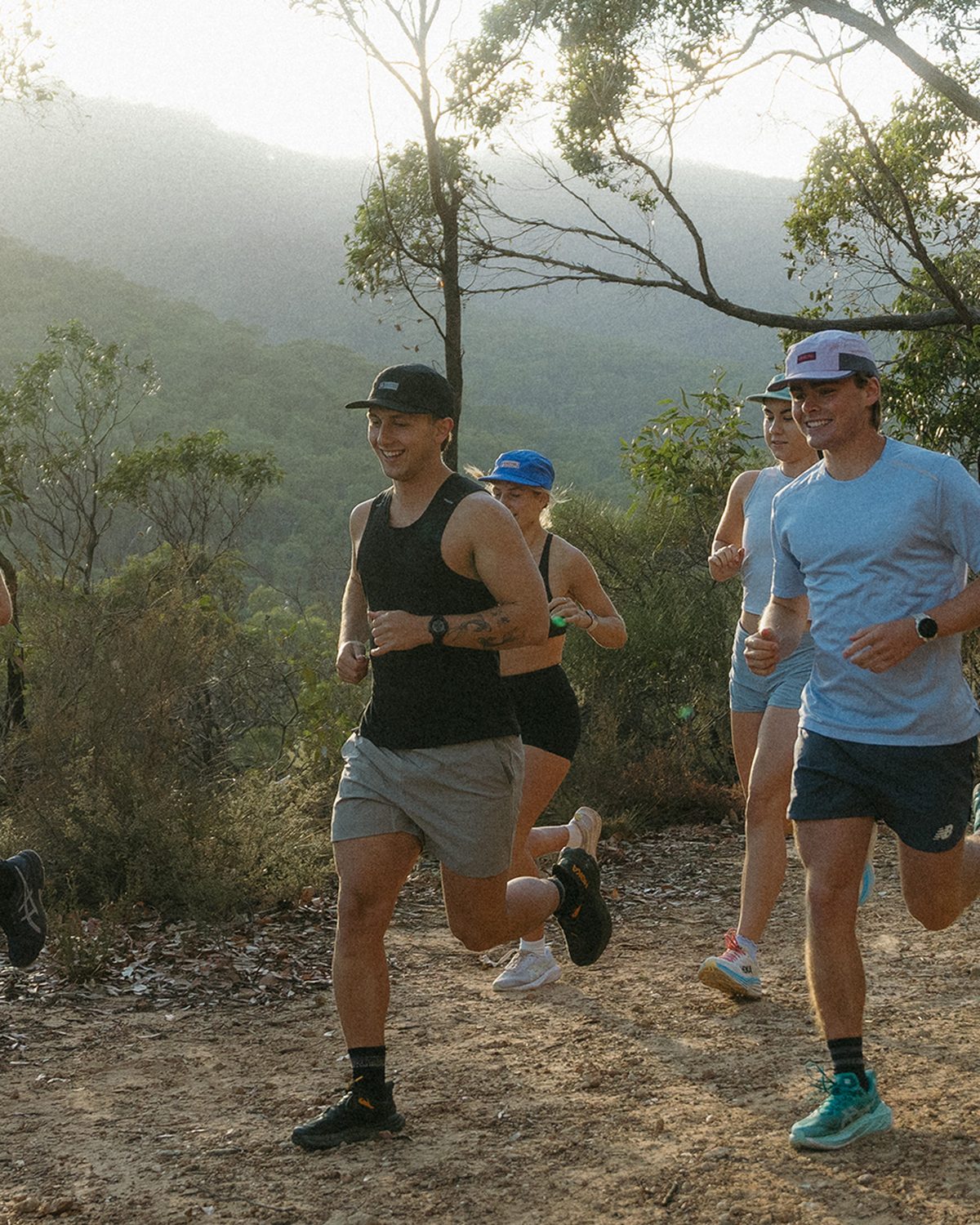 Australian plant running collection: runners in Fractel gear on a bush trail